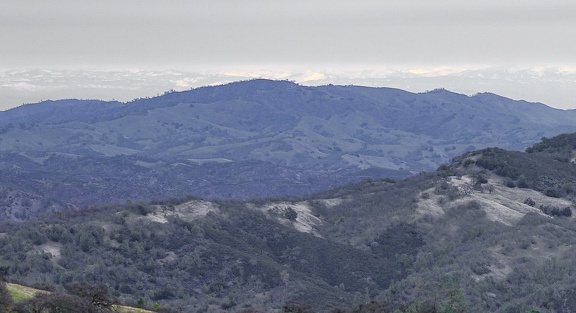 A glimpse of the distant Sierra from Steer Ridge on a very gray day
