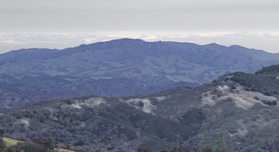 A glimpse of the distant Sierra from Steer Ridge on a very gray day