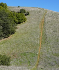 A hiker atop the Phegley Ridge Trail "wall"