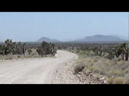 1.5 downhill miles on the old Mail Spring Road, then 3.5 miles down Ivanpah Rd into the Lanfair Valley