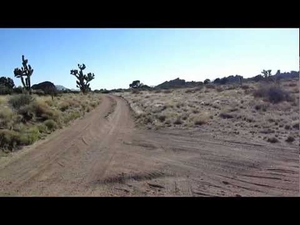 I arrive at the junction of New York Mountains Road and Carruthers Canyon, the first of two summits today