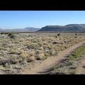 A gentle downhill begins as I start crossing the Watson Wash area on New York Mountains Road, Mojave National Preserve