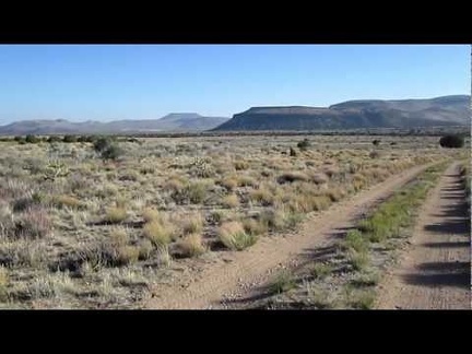 A gentle downhill begins as I start crossing the Watson Wash area on New York Mountains Road, Mojave National Preserve