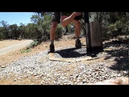 I rinse my hair under a tap at Mid Hills Campground as part of breaking camp today