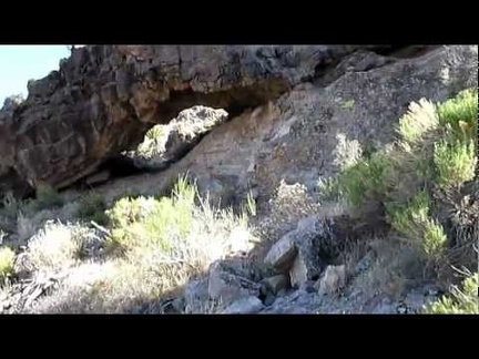 On the way out of Woods Wash, I walk a short distance up a side wash and stumble across a small natural arch