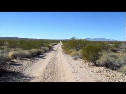 I ride west on the pipeline road toward the old Rattlesnake Mine area