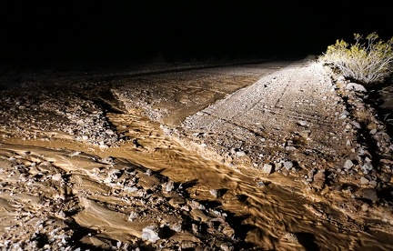 Minor flooding on a road in Death Valley National Park after heavy rain