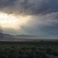 Sun pokes through the clouds near Mono Lake