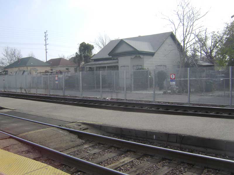 Across the tracks from the Stockton Amtrak station is an old house that looks abandoned, but isn't