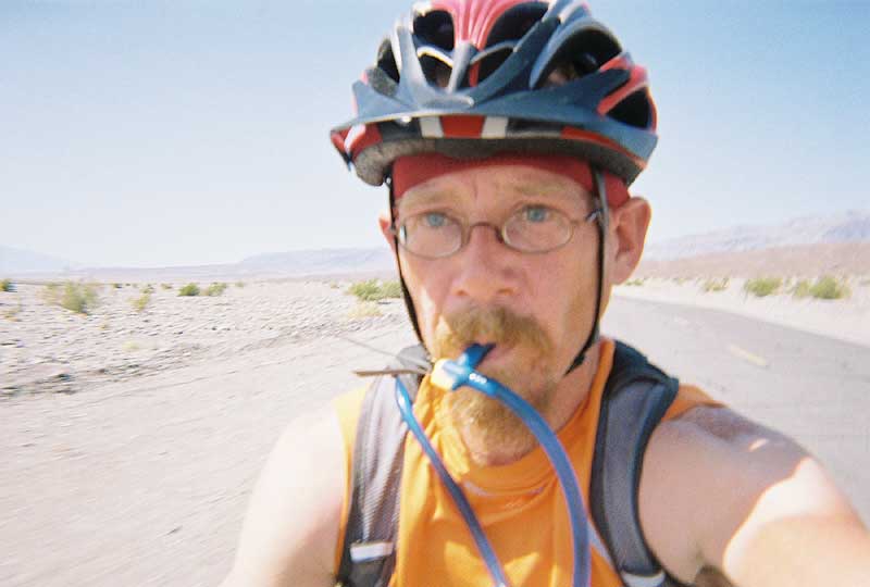 I suck back lots of now-hot water from my Camelbak on this hot ride down Highway 190