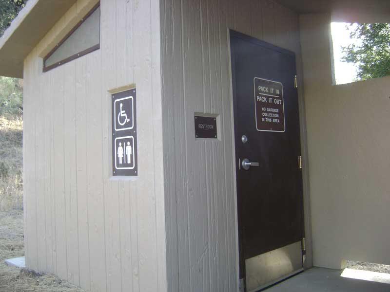 The modern, concrete, wheelchair-accessible outhouse just up the hill from the Pacheco Camp buildings.