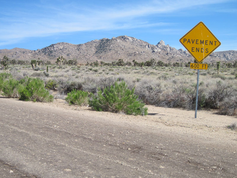 Cedar Canyon Road's famous "pavement ends" sign, Mojave National Preserve