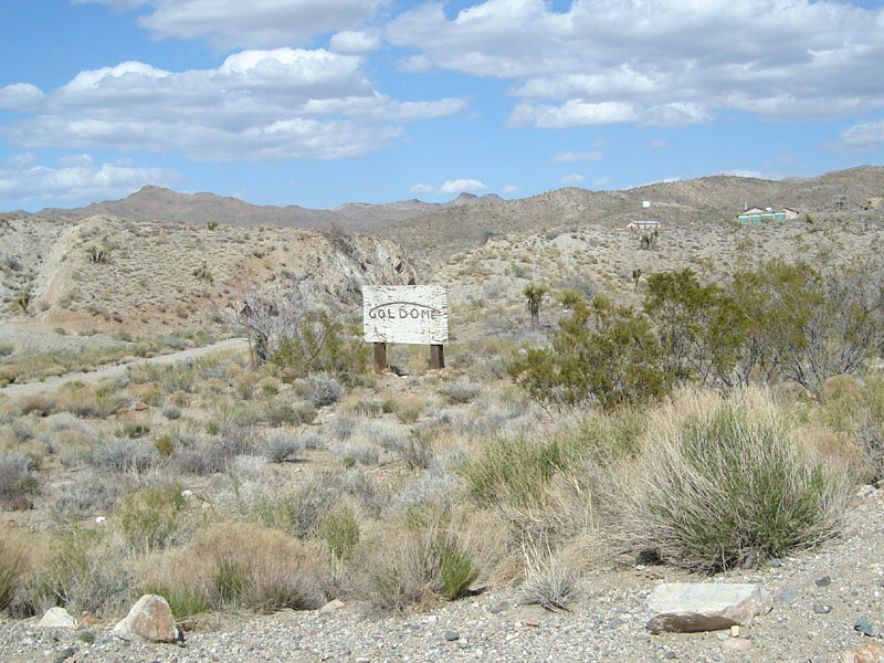 I pass the worn sign to the old Goldome mine