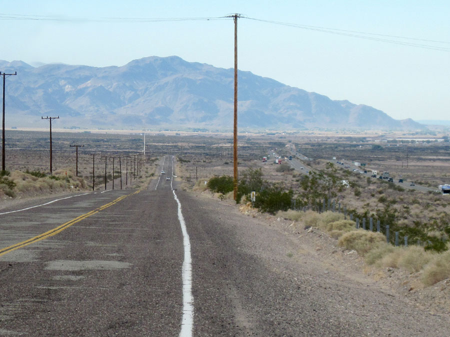 I begin the slight downhill on old Route 66 into the town of Newberry Springs, with the Newberry Mountains in the background