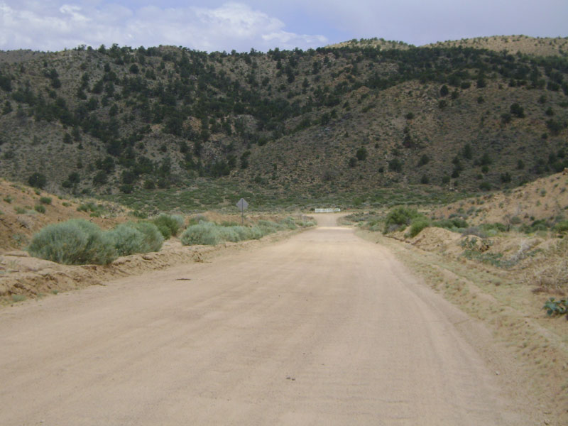 Next, I ride two miles down the washboarded Black Canyon Road, which ends at a T-intersection in Cedar Canyon