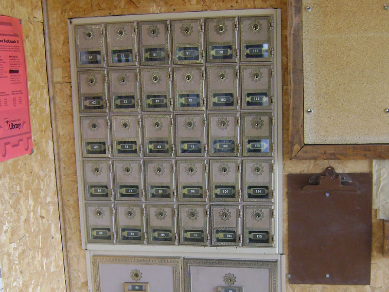 The real gem of the Cima post office is its set of antique postal boxes, apparently still in service