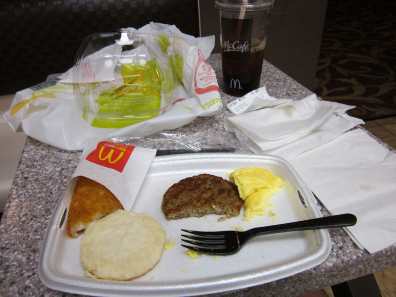 I eat breakfast at the McDonald's downstairs in the Whiskey Pete's casino; there's more garbage than food on my table